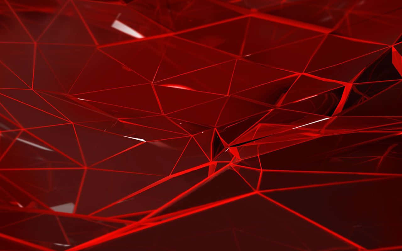 Red Abstract 桌布 壁紙 — 一個帶有銳利三角形切面及明亮高光、反射光線的光滑紅色幾何表面。
