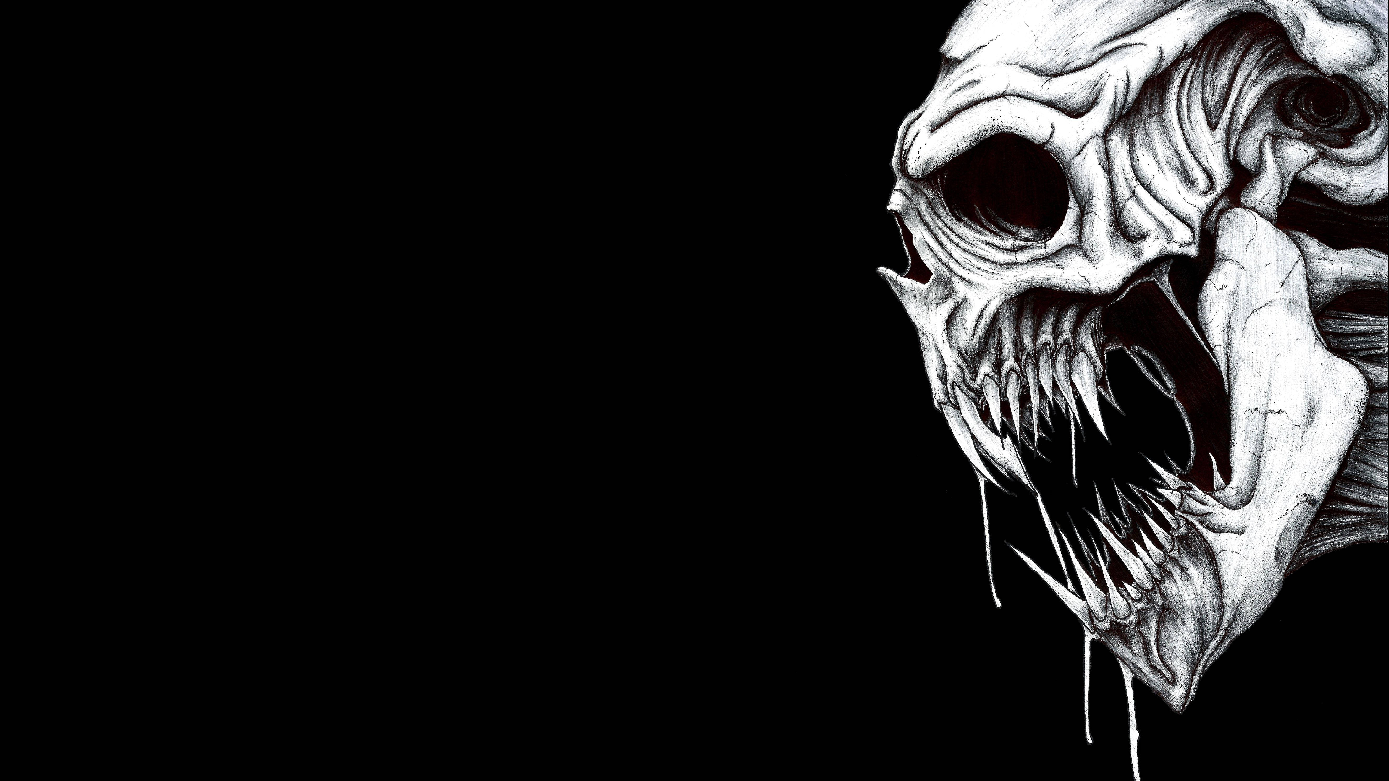 Black Skull 桌布 壁紙 — 一個帶有鋒利牙齒和滴落唾液的威脅性白色頭骨，在 stark 黑色背景上隱現。