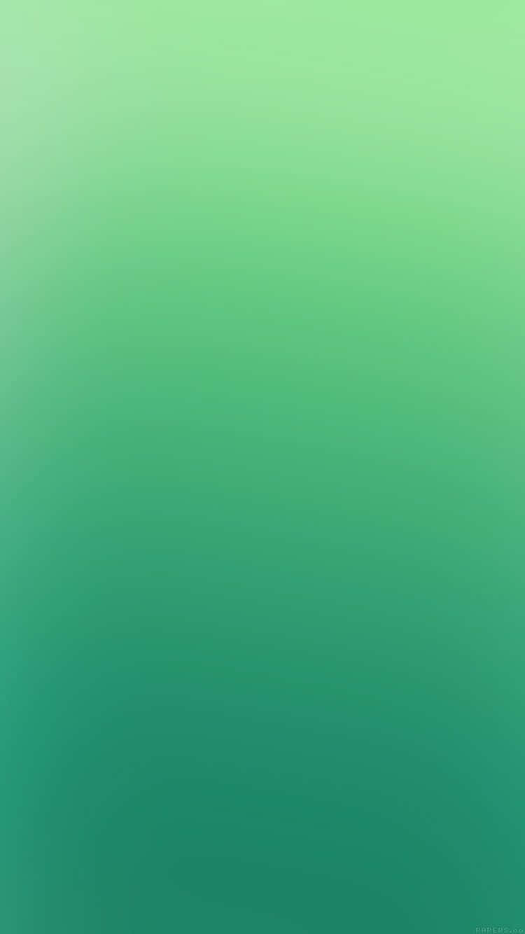 漸層 桌布 壁紙 — 一個平靜的漸變桌布，從柔和的薄荷綠過渡到深藍綠色，沒有可見的物體或紋理。