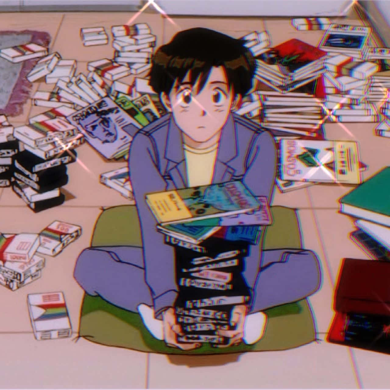動漫 桌布 壁紙 — 一個年輕的動漫男孩盤腿坐在綠色墊子上，周圍散落著書本和磁帶在瓷磚地板上。