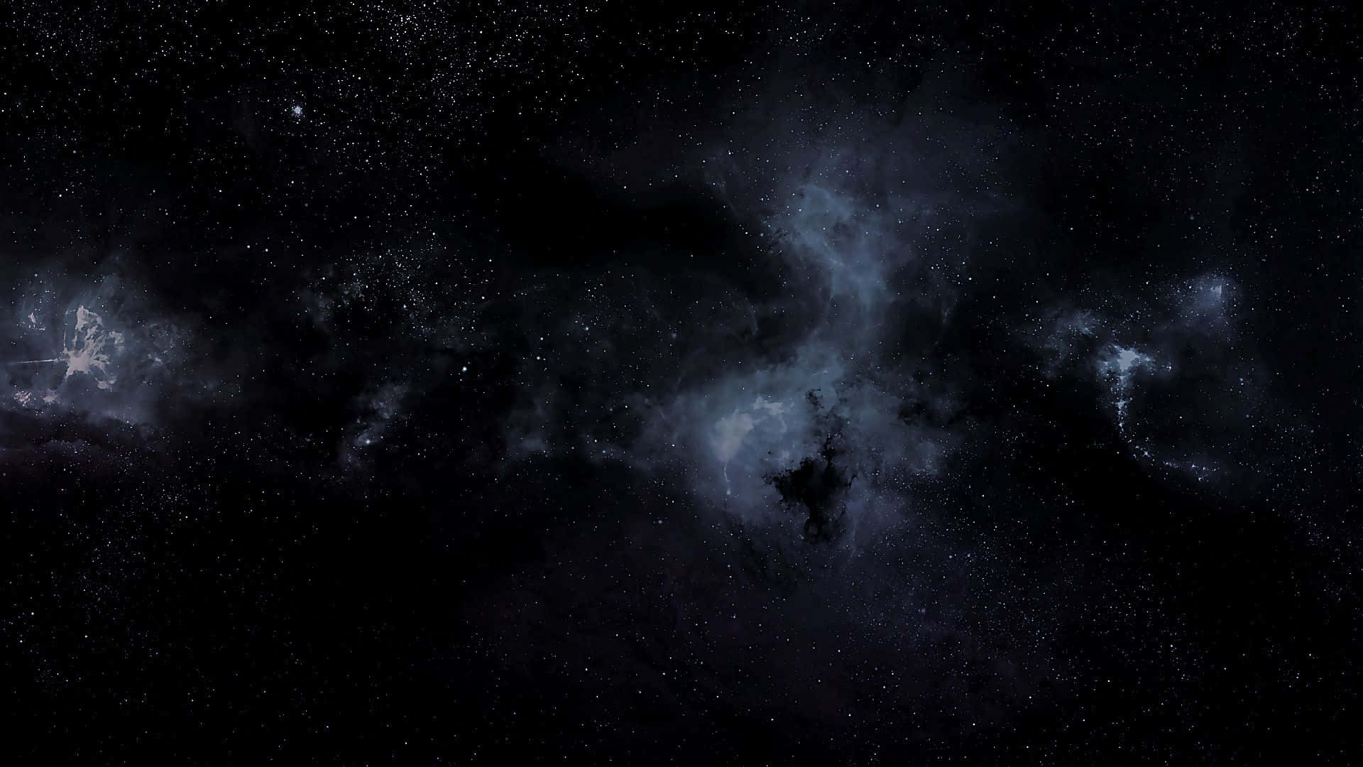 太空 桌布 壁紙 — 一個廣闊的宇宙星雲，有藍色和紫色的漩渦雲，被遙遠的星星照亮，背景是深邃的黑色虛空。