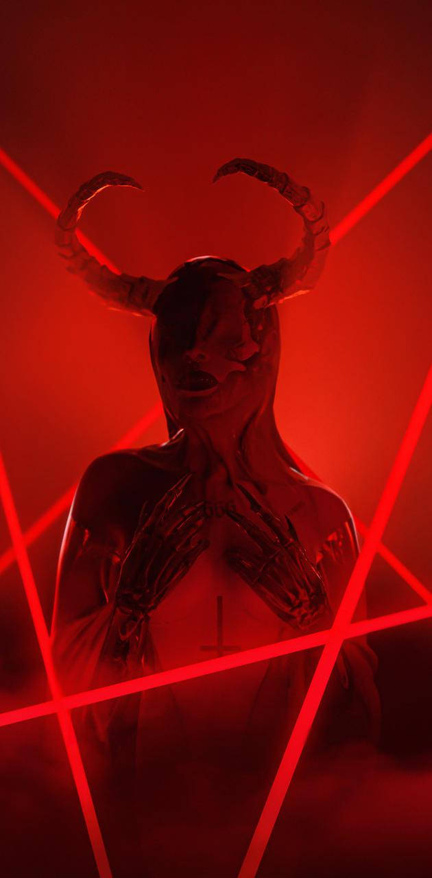 酷炫惡魔 桌布 壁紙 — 一個彎曲角、骷髏手的惡魔般人物，站在被發光雷射光束框住的紅色房間中。