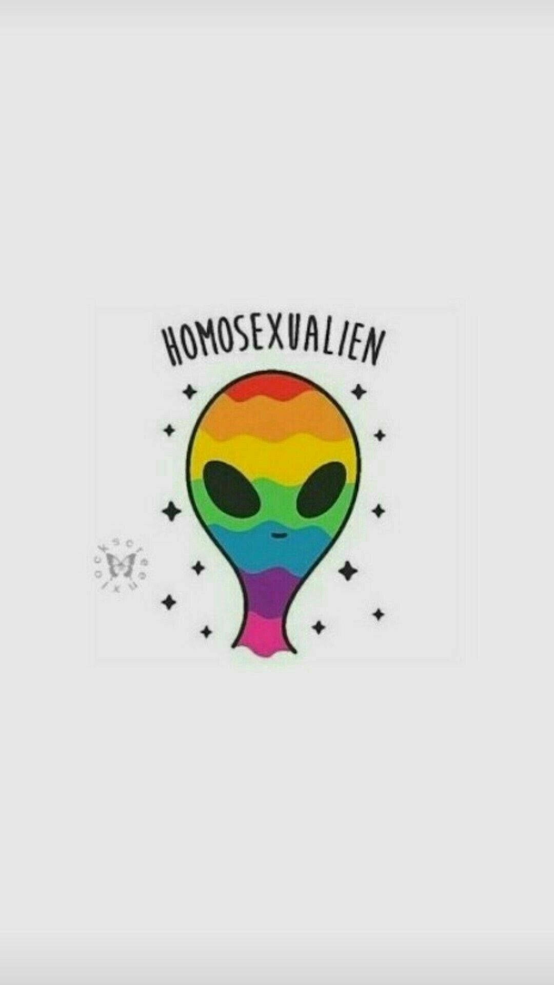 外星人 桌布 壁紙 — 一個彩虹色的外星人，有大黑眼睛，上面有「HOMOSEXUALIEN」這個詞，周圍有星星。