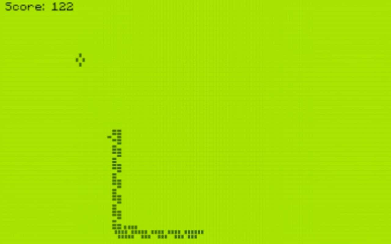 Snake Game 桌布 壁紙 — 一個復古像素遊戲場景，綠色網格背景，顯示一個正在下落的方塊和分數122。