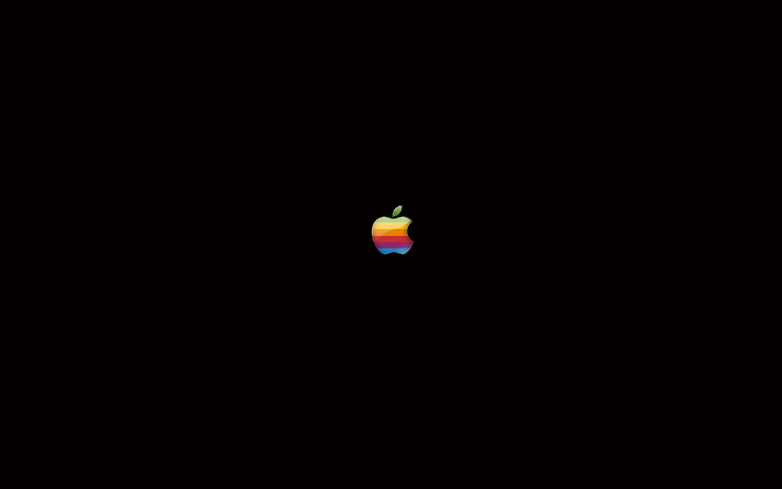桌布 壁紙 — 一個復古彩虹Apple標誌居中在純黑色背景上。
