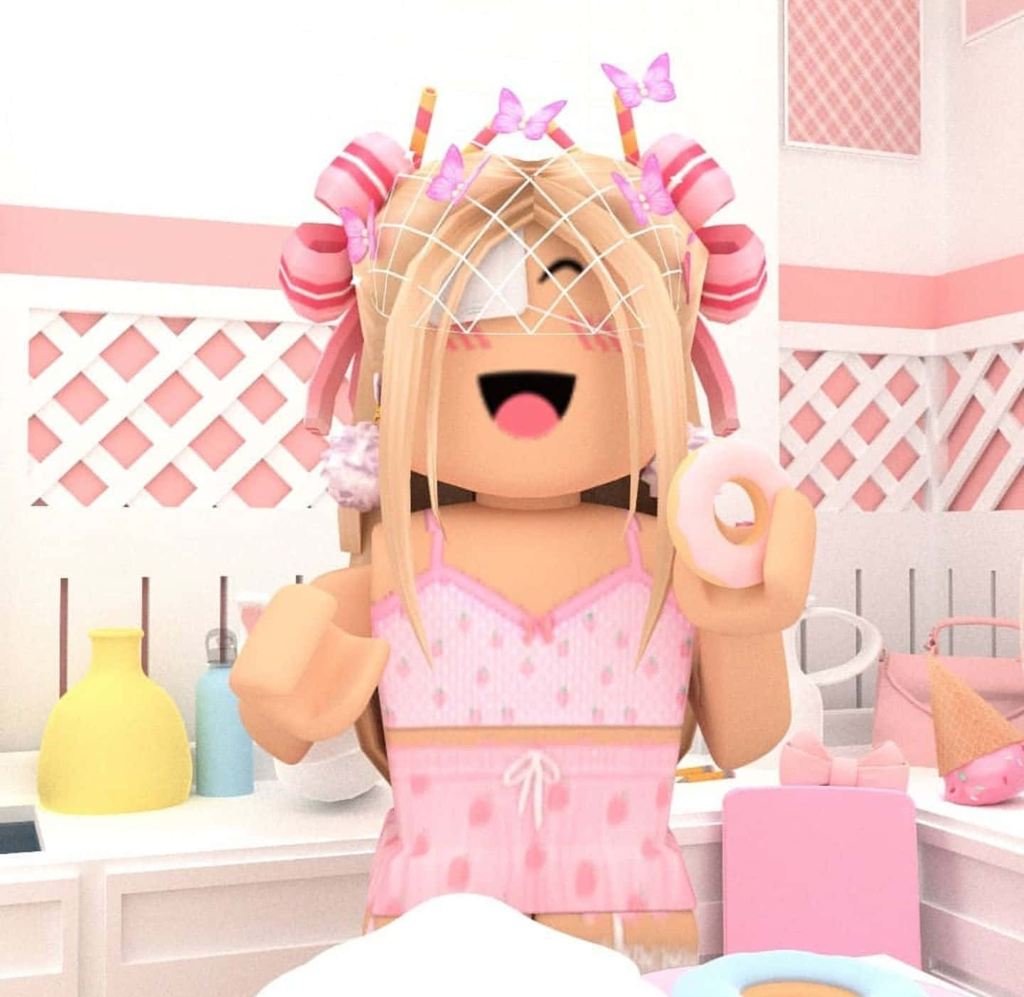 美學 Roblox 女孩 桌布 壁紙 — 一個快樂的Roblox頭像，戴著粉紅色髮飾，拿著甜甜圈，在粉紅色廚房裡微笑。