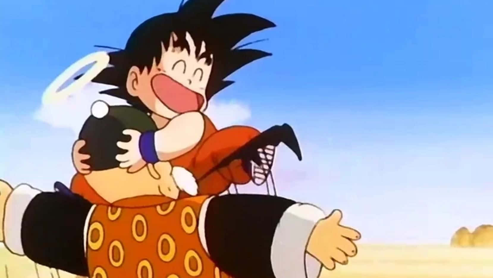 Grandpa Gohan 桌布 壁紙 — 一個快樂的年輕悟空在明亮的藍天白雲下擁抱一個黑色小生物。