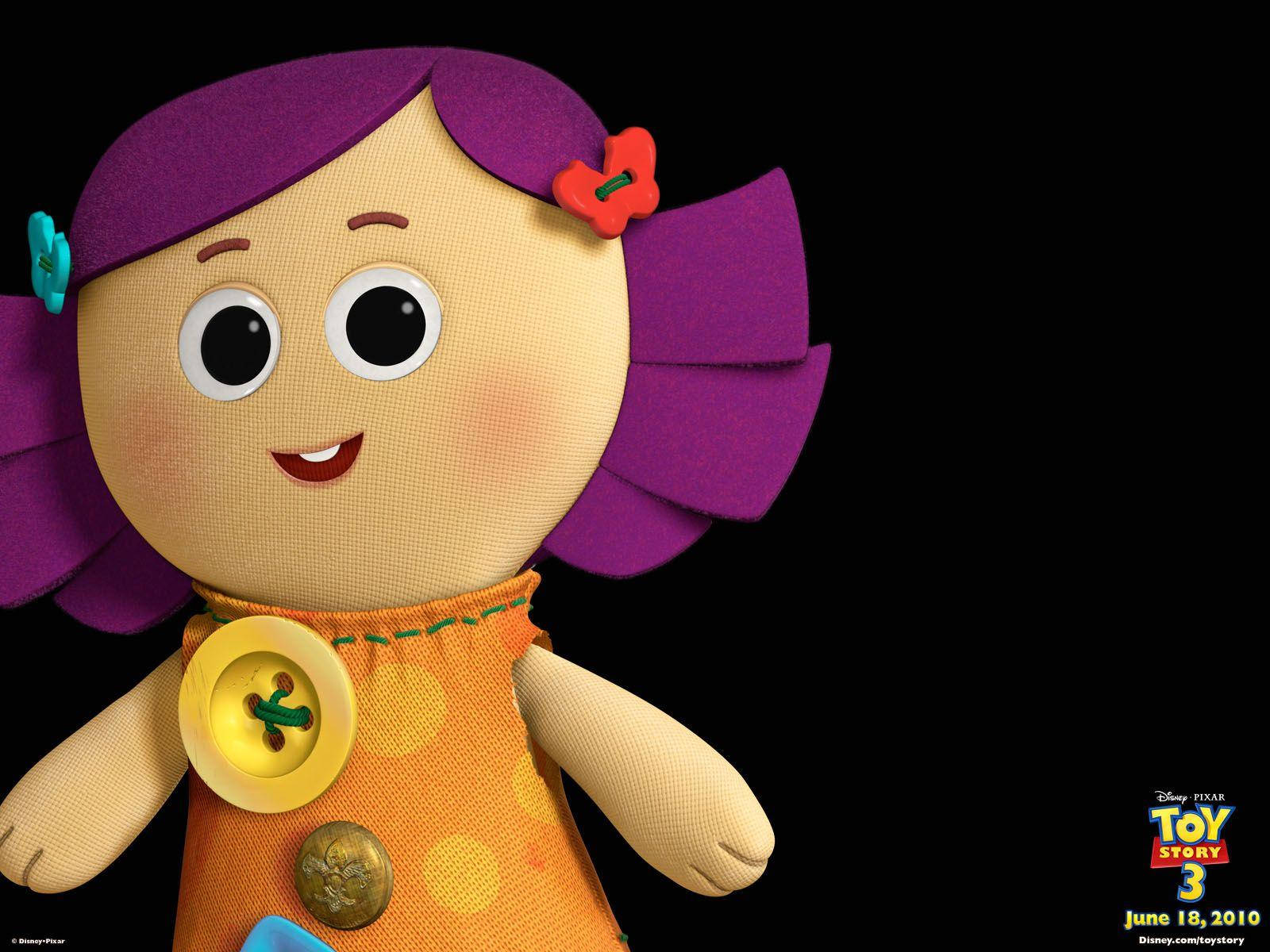 Toy Story 3 桌布 壁紙 — 一個快樂的手工娃娃，紫色布髮和橙色圓點裙，在黑色背景上微笑。