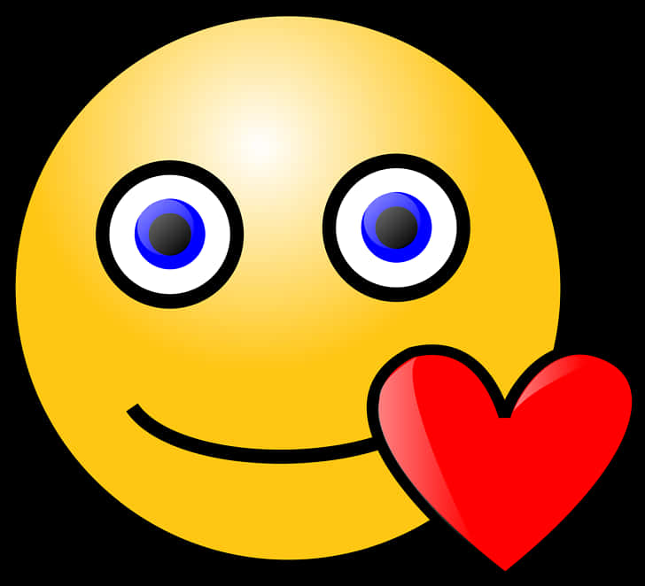 Love Emoji 桌布 壁紙 — 一個快樂的黃色表情符號，藍色眼睛，在黑色背景上拿著一個鮮紅色的心微笑。