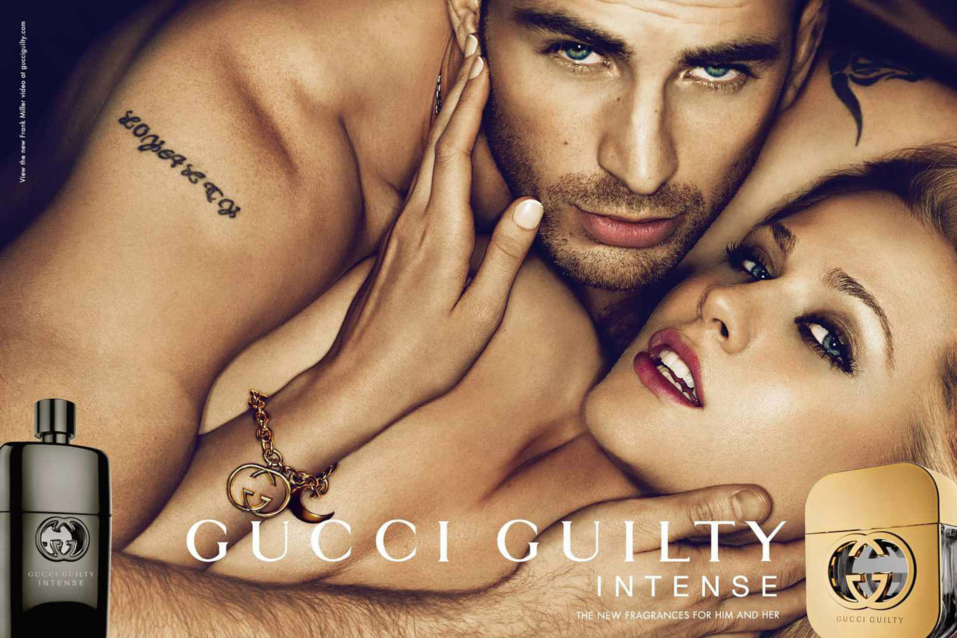 Gucci 桌布 壁紙 — 一個性感特寫，一名赤裸上身的男子和一名女子親密擁抱，Gucci Guilty 香水瓶突出展示。