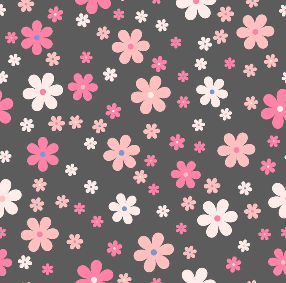 Cute Floral 桌布 壁紙 — 一個愉快的圖案，粉紅色、白色和柔和色調的花朵散落在深灰色背景上。