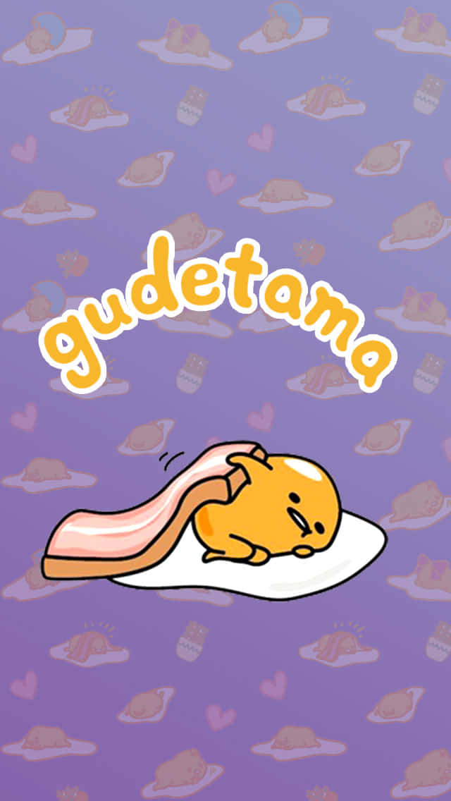 Gudetama 懶惰雞蛋角色在培根上休息。