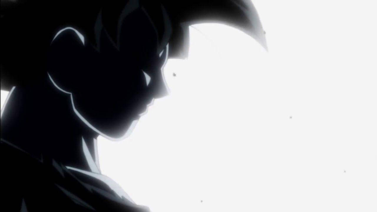 Ultra Instinct Goku 桌布 壁紙 — 一個戲劇性的動漫剪影，描繪一個刺蝟頭髮的男性角色側面，背景是明亮的白色。