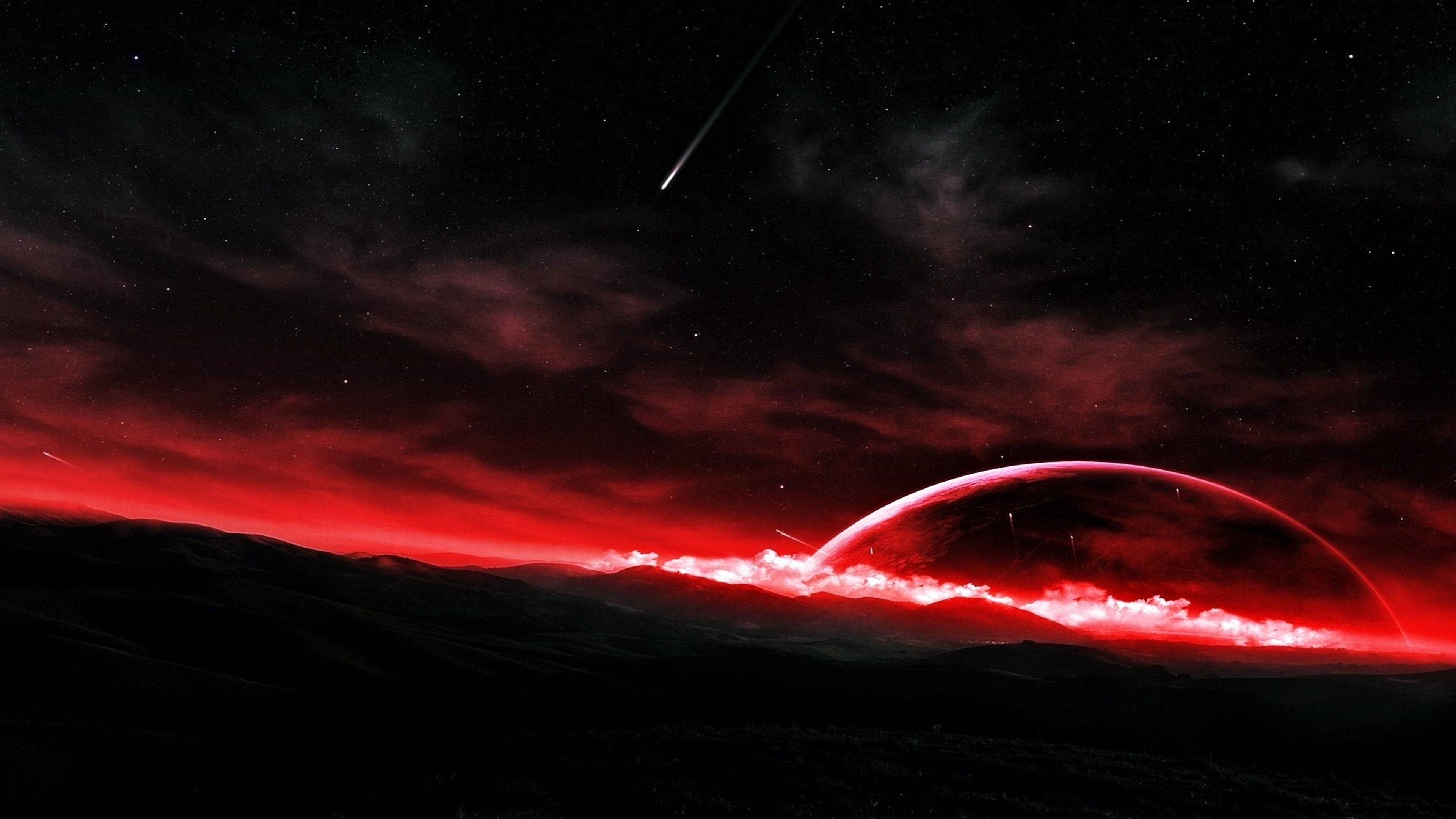 夜空 桌布 壁紙 — 一個戲劇性的外星景觀在流星劃過的星空下，散發著火紅色的極光光芒。