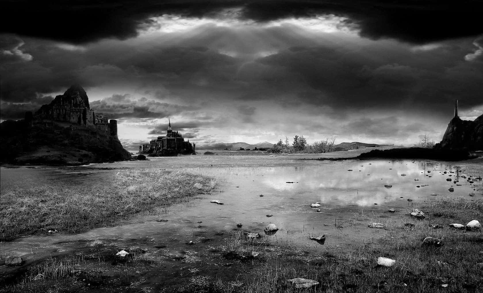 Black And White Landscape 桌布 壁紙 — 一個戲劇性的黑白景觀，岩石露頭上的古代遺跡在風暴天空下倒映在淺淺的岩石水道中。