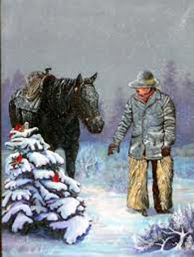 Cowboy Christmas 桌布 壁紙 — 一個戴帽子和外套的男人站在一匹黑馬旁邊，靠近一棵被雪覆蓋的松樹，在冬季景觀中。