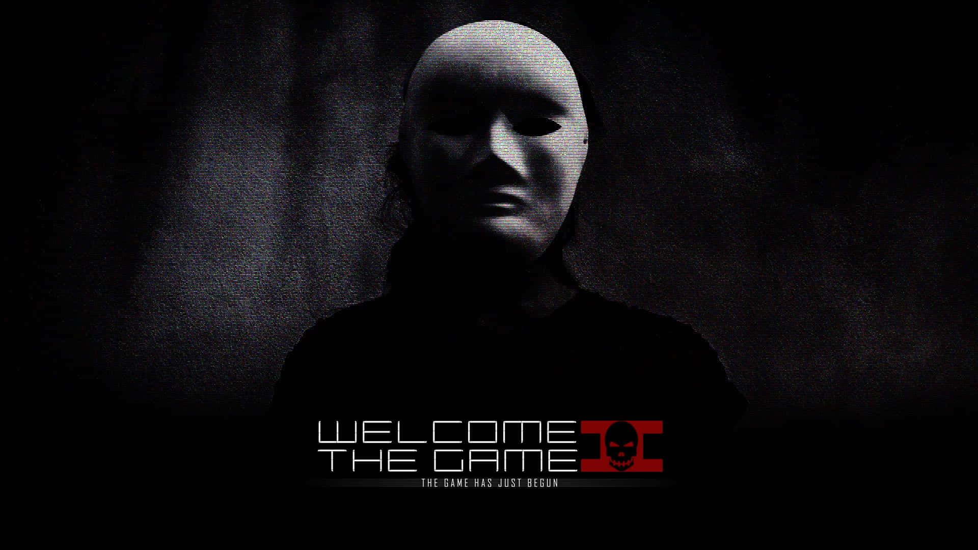 Welcome Gaming 桌布 壁紙 — 一個戴白色面具的人站在陰暗的黑暗中，上面寫著welcome the game。