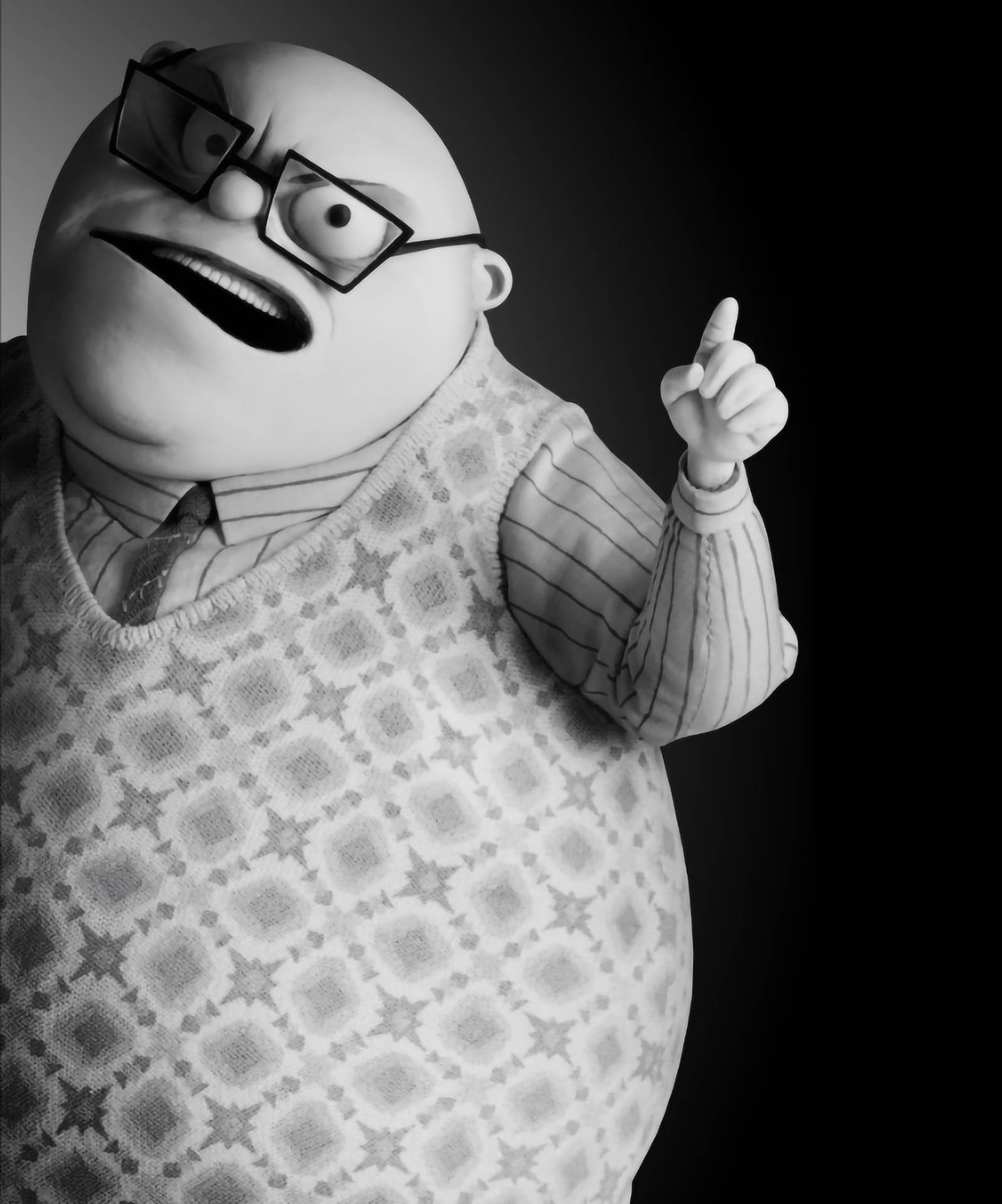 Frankenweenie 桌布 壁紙 — 一個戴眼鏡、身穿圖案毛衣的黑白動畫角色，表情強烈地向上指。