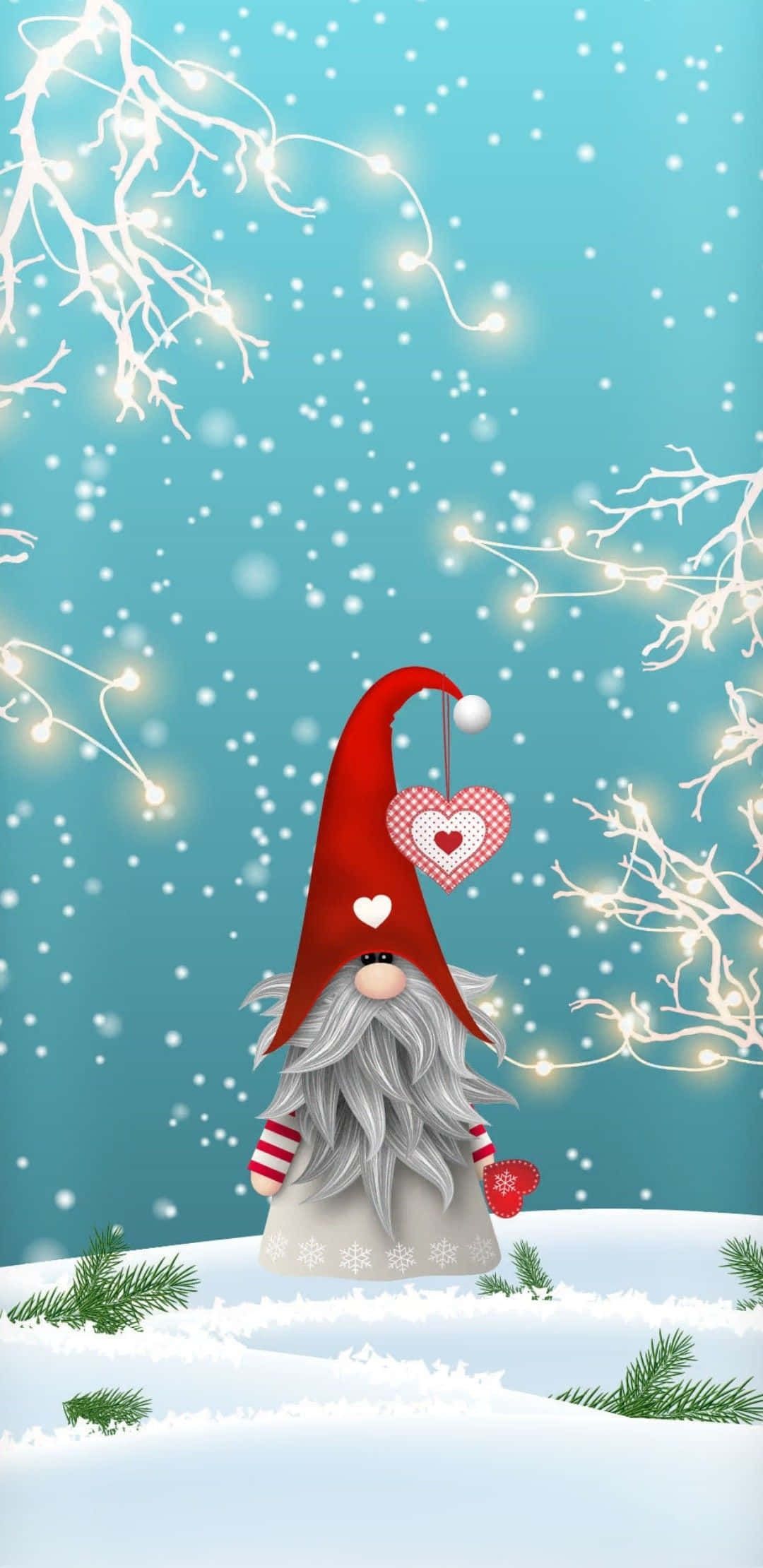Christmas Gnome 桌布 壁紙 — 一個戴紅帽、有心形裝飾的快樂雪地精靈，站在有發光燈串和光禿樹枝的雪地冬日場景中。