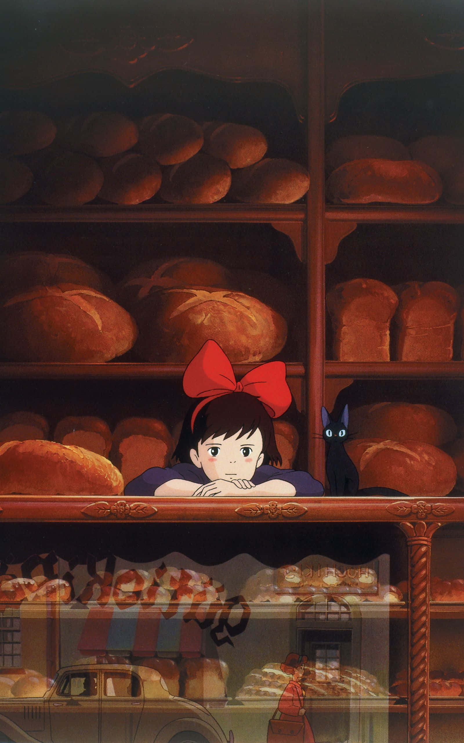 kiki's delivery service 桌布 壁紙 — 一個戴紅色蝴蝶結的小女孩和一隻黑貓，正從一個擺滿金黃色麵包的麵包店櫃檯上方探頭張望。