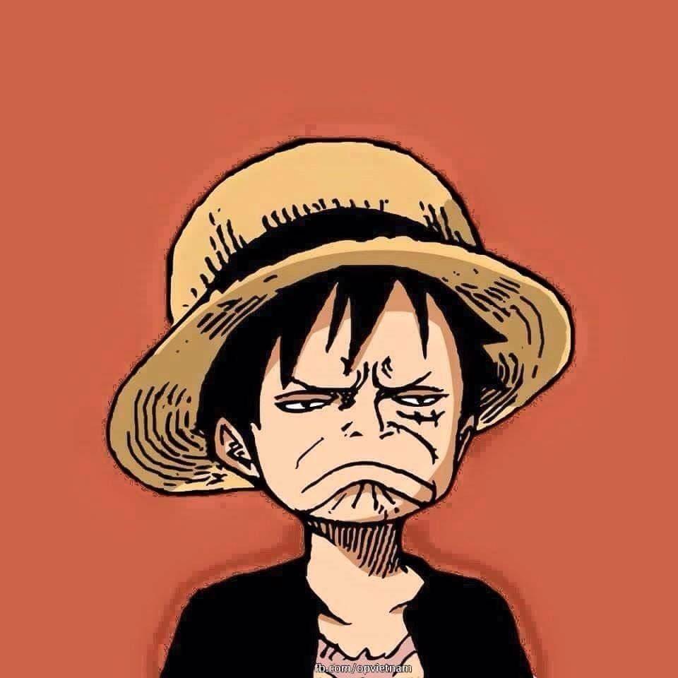 Luffy Funny 桌布 壁紙 — 一個戴草帽、表情憤怒的卡通男孩，背景為純橙色。