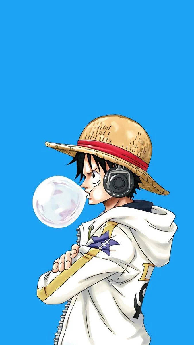 超讚動畫 桌布 壁紙 — 一個戴草帽的年輕動漫男孩在純藍色背景上吹泡泡。