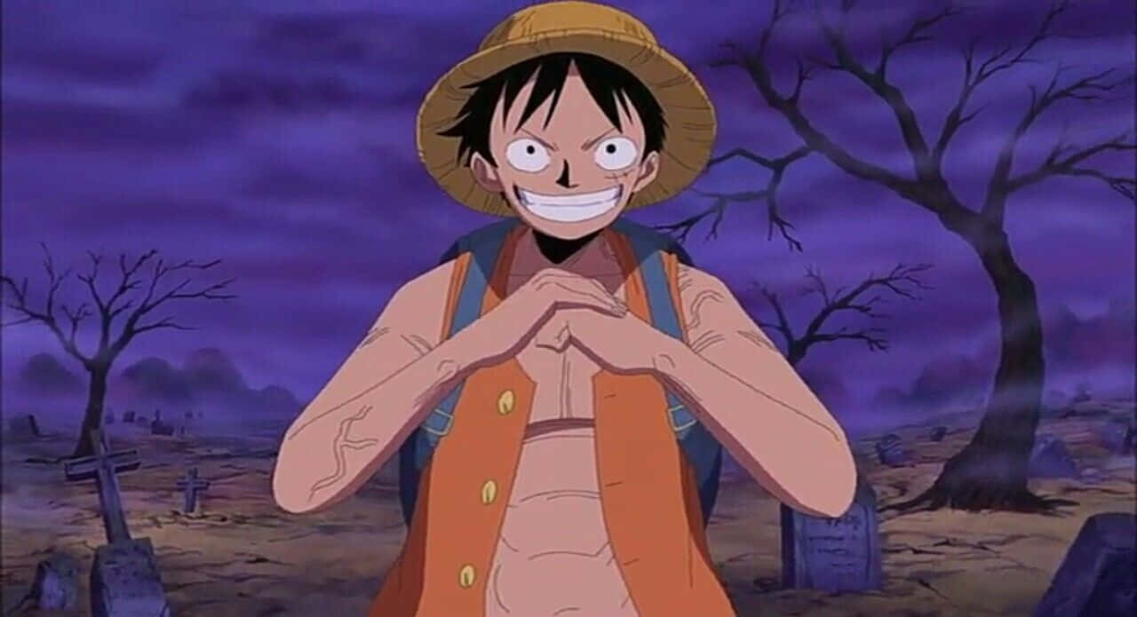 Thriller Bark 桌布 壁紙 — 一個戴草帽的開朗動畫男孩站在墓地，背景是紫色黃昏天空，有光禿禿的樹木和墓碑。