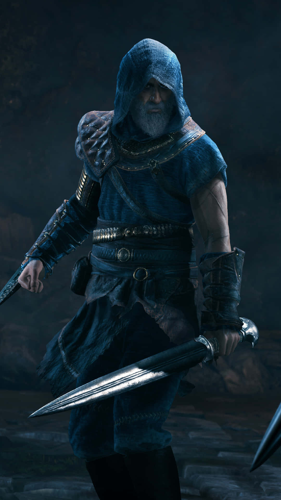 sword 桌布 壁紙 — 一個戴著兜帽、留著長鬍鬚的刺客在光線昏暗的石室中握著一把匕首。