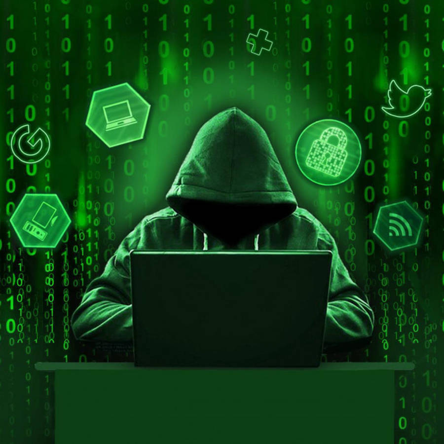 hacker 3d 桌布 壁紙 — 一個戴著兜帽的人坐在筆記型電腦前，周圍環繞著發光的綠色數位圖示和落下的二進位代碼。