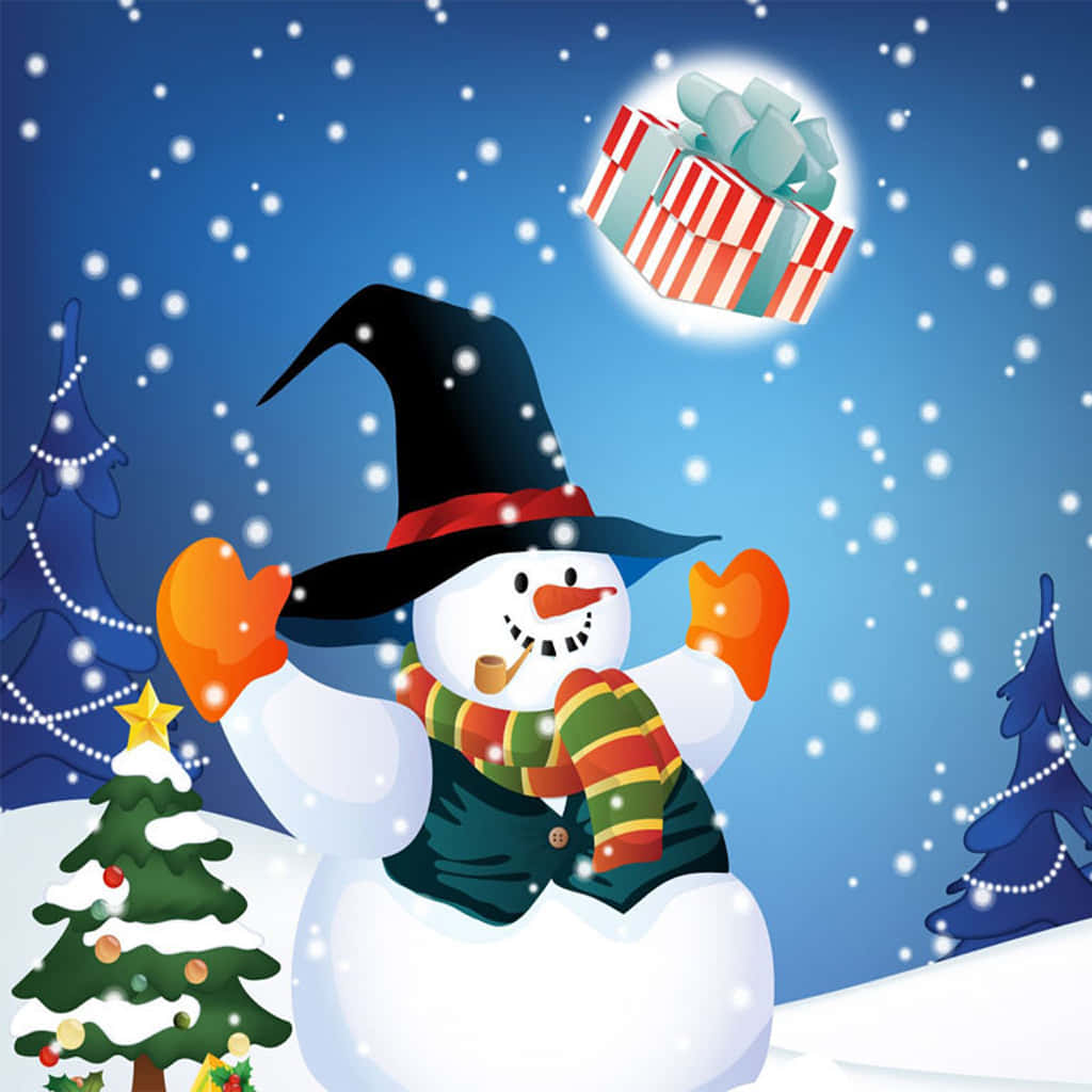 桌布 壁紙 — 一個戴著巫師帽和圍巾的快樂雪人，在飄雪中歡快地將一個條紋禮物盒扔向裝飾好的聖誕樹旁。