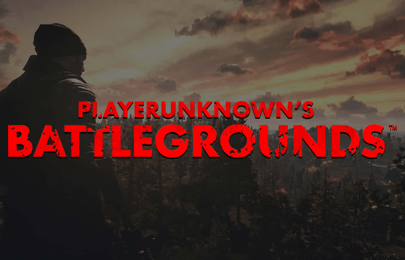 Playerunknowns Battleground Desktop 桌布 壁紙 — 一個戴著毛帽的剪影士兵俯瞰日落時分的森林戰場，遊戲標題「PLAYERUNKNOWN'S BATTLEGROUNDS」以粗體紅色字母呈現。