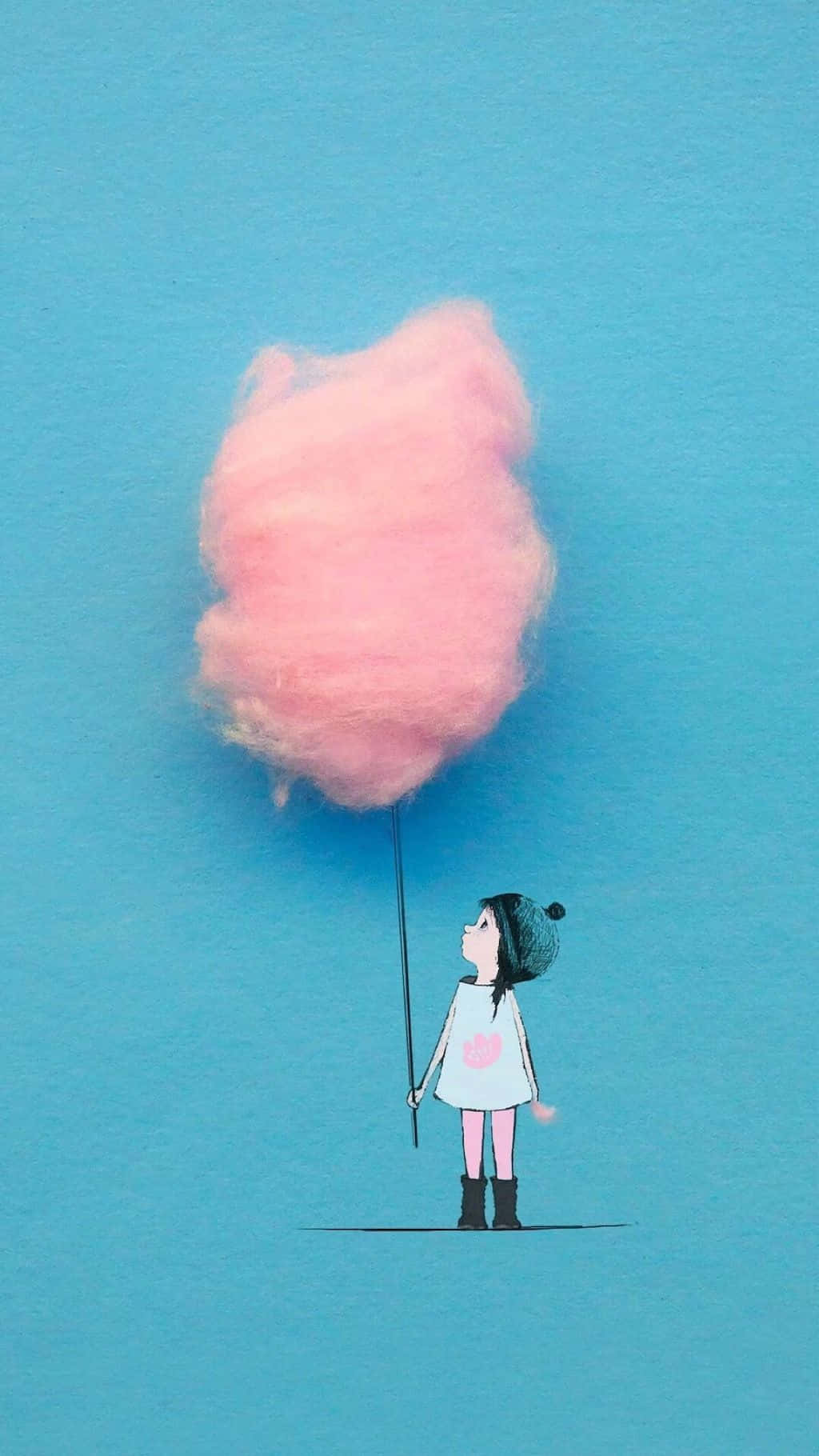 女孩 桌布 壁紙 — 一個戴著毛線帽的小女孩，在純藍色背景前，拿著一根插著巨大粉紅色棉花糖的棍子。