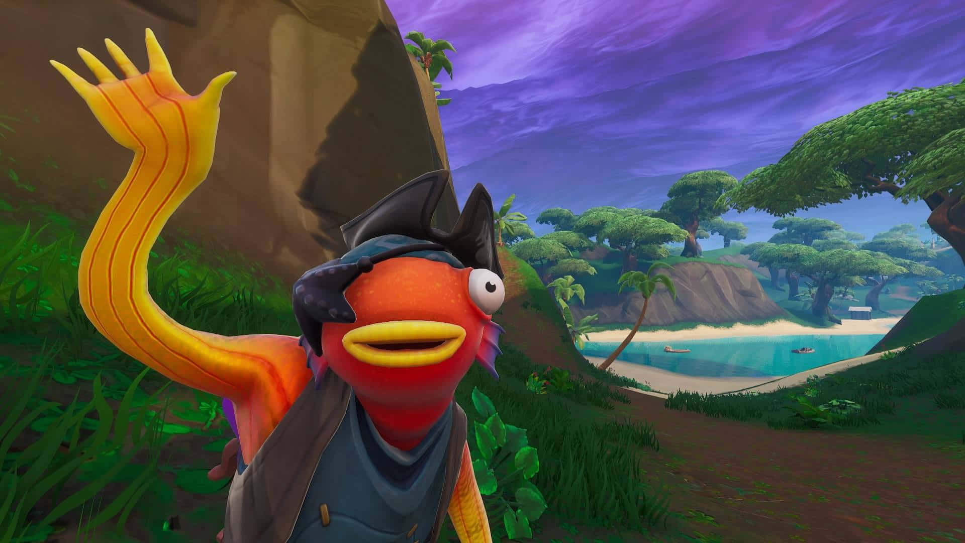 Fishstick 桌布 壁紙 — 一個戴著海盜帽的卡通魚角色在茂密的熱帶景觀中愉快地揮手，背景有沙灘和紫色天空。