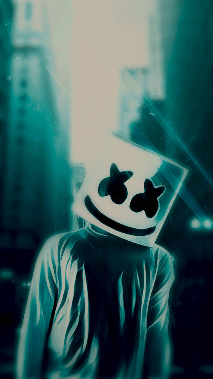 marshmello iPhone 桌布 壁紙 — 一個戴著發光白色棉花糖頭盔的人物，站在朦朧的藍綠色城市小巷中，光線穿透而過。