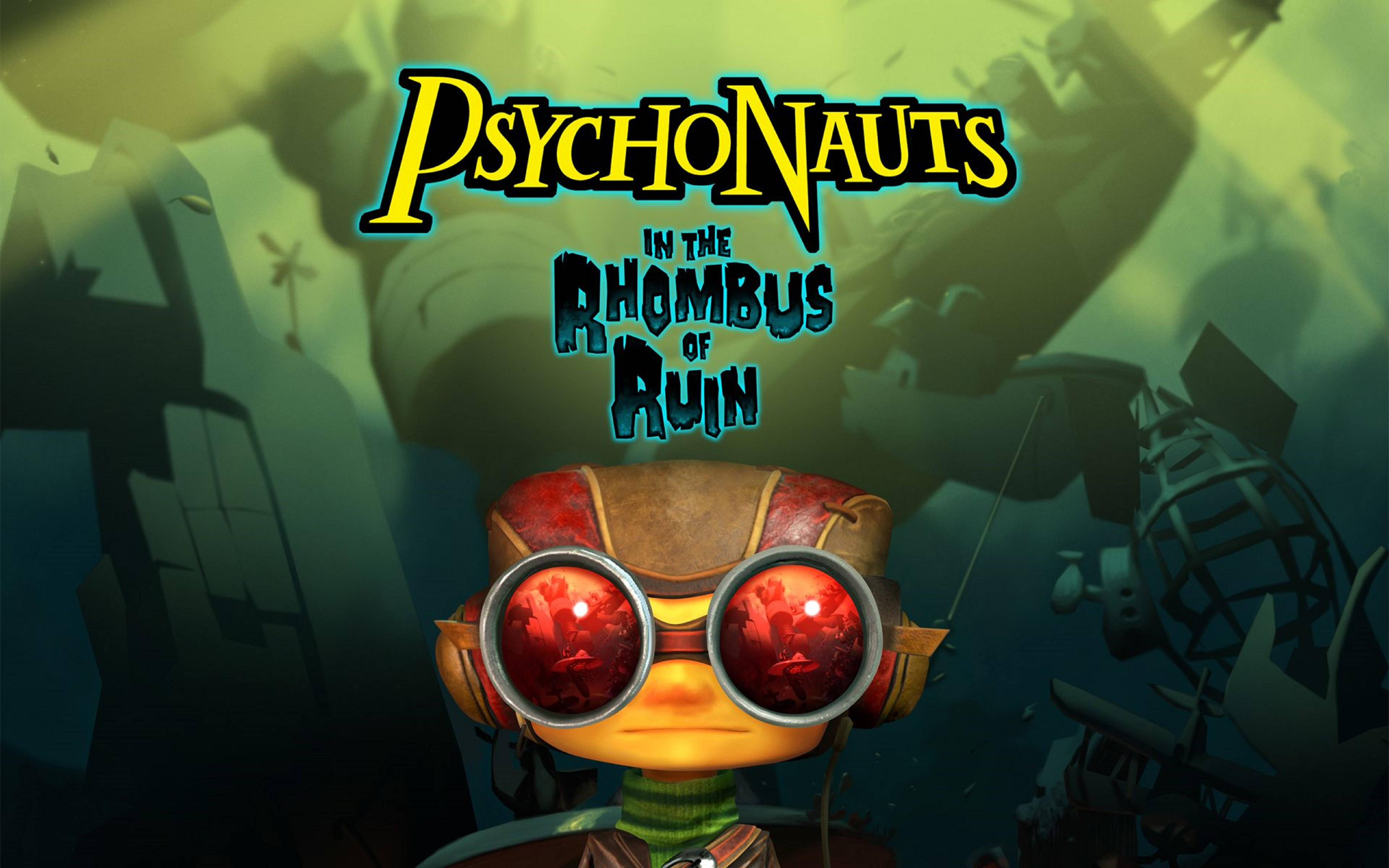 Psychonauts 桌布 壁紙 — 一個戴著發光紅色護目鏡的卡通角色，在超現實的綠色和藍色背景前凝視前方，背景顯示遊戲標題 Psychonauts in the Rhombus of Ruin。