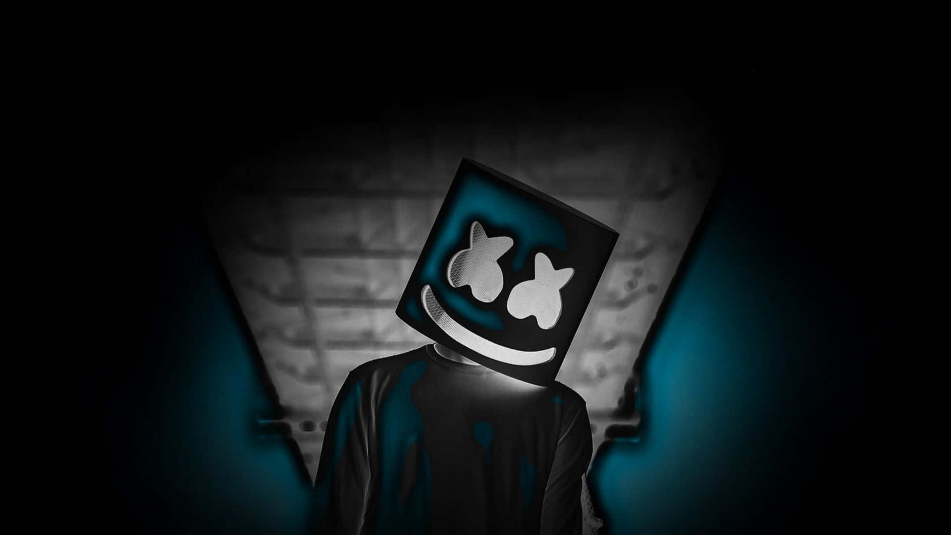 Marshmello 動態圖 桌布 壁紙 — 一個戴著發光藍色方形面具、露出燦爛笑容的人物，站在被藍色聚光燈照亮的黑暗隧道中。