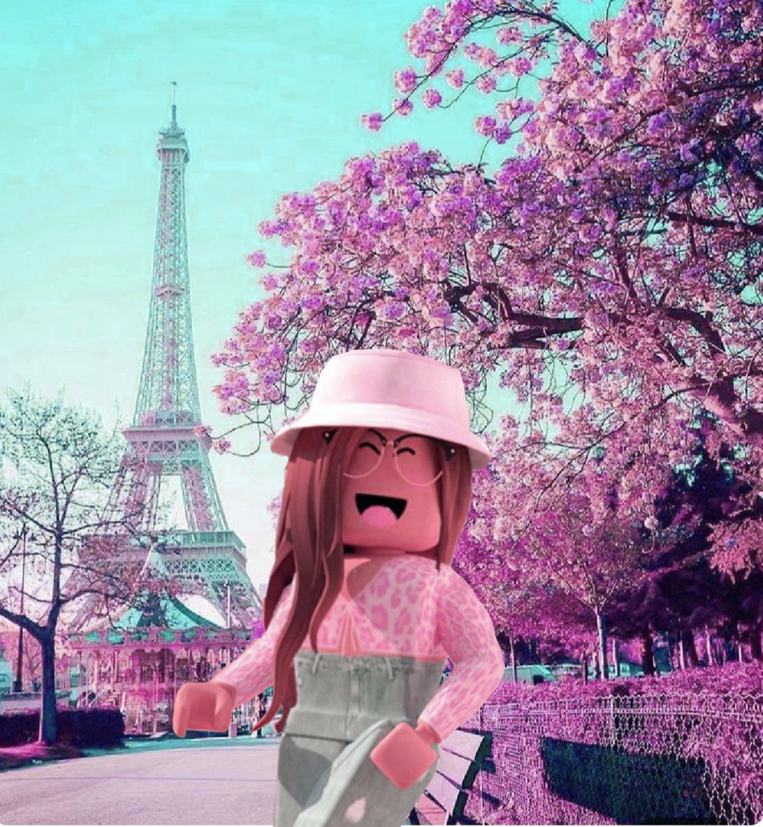 Roblox 女孩 桌布 壁紙 — 一個戴著粉紅色帽子的快樂Roblox頭像在盛開的櫻花樹下大笑，背景是艾菲爾鐵塔。