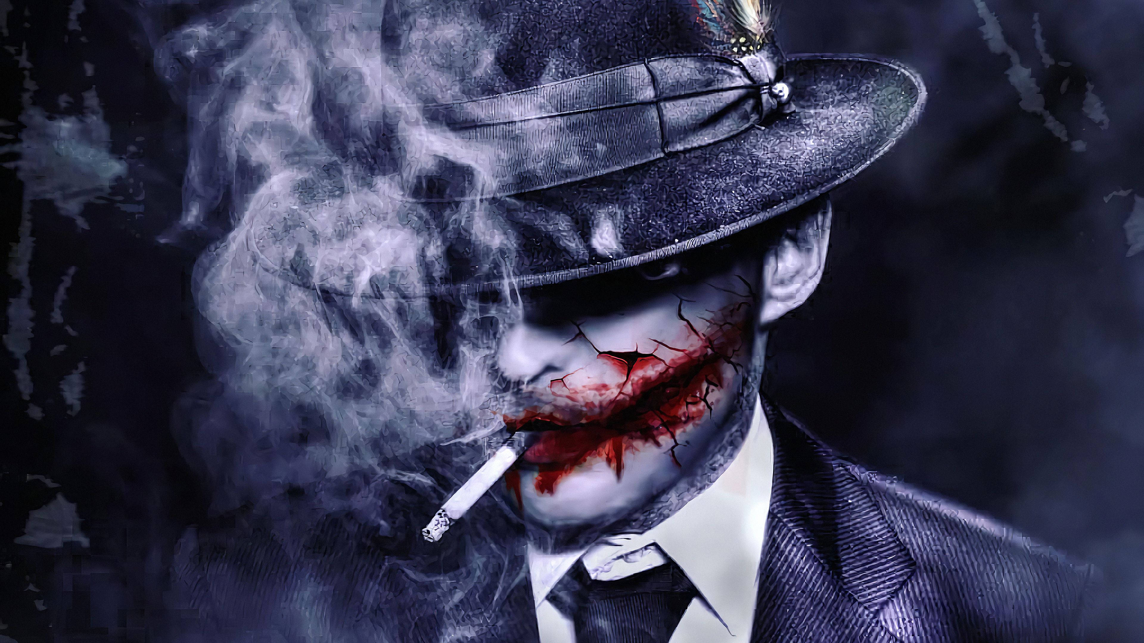 桌布 壁紙 — 一個戴著紳士帽的威脅人物正在抽煙，煙霧圍繞著他裂開的紅唇臉龐旋轉。