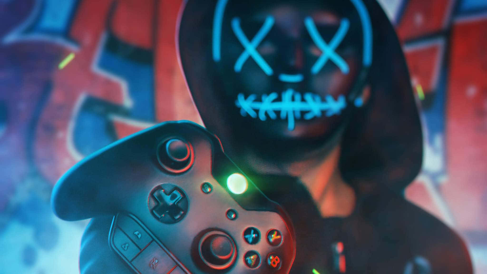 2048x1152 Gaming 桌布 壁紙 — 一個戴著連帽衫的人物，臉上縫著發光的藍色線條，手持亮著的遊戲控制器，背景是塗鴉牆。