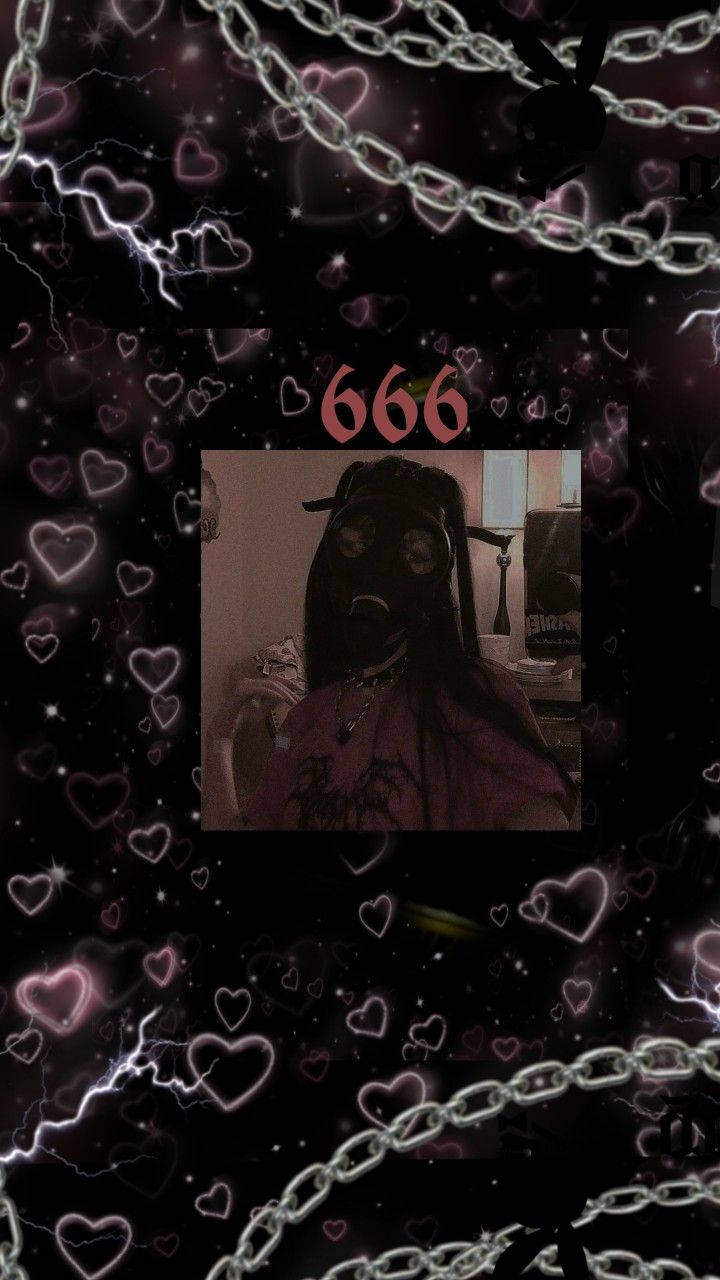Grunge Emo Aesthetic 桌布 壁紙 — 一個戴著防毒面具的人坐在黑暗背景中，被發光的心形、鎖鏈和閃電包圍，並有數字666。