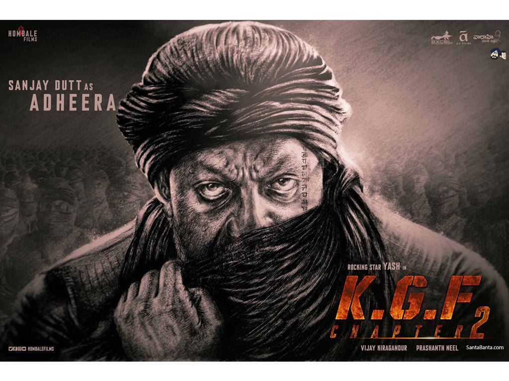 Kgf 2 桌布 壁紙 — 一個戴著頭巾和圍巾、眼神銳利、臉頰有刺青的男人的粗獷炭筆風格肖像。