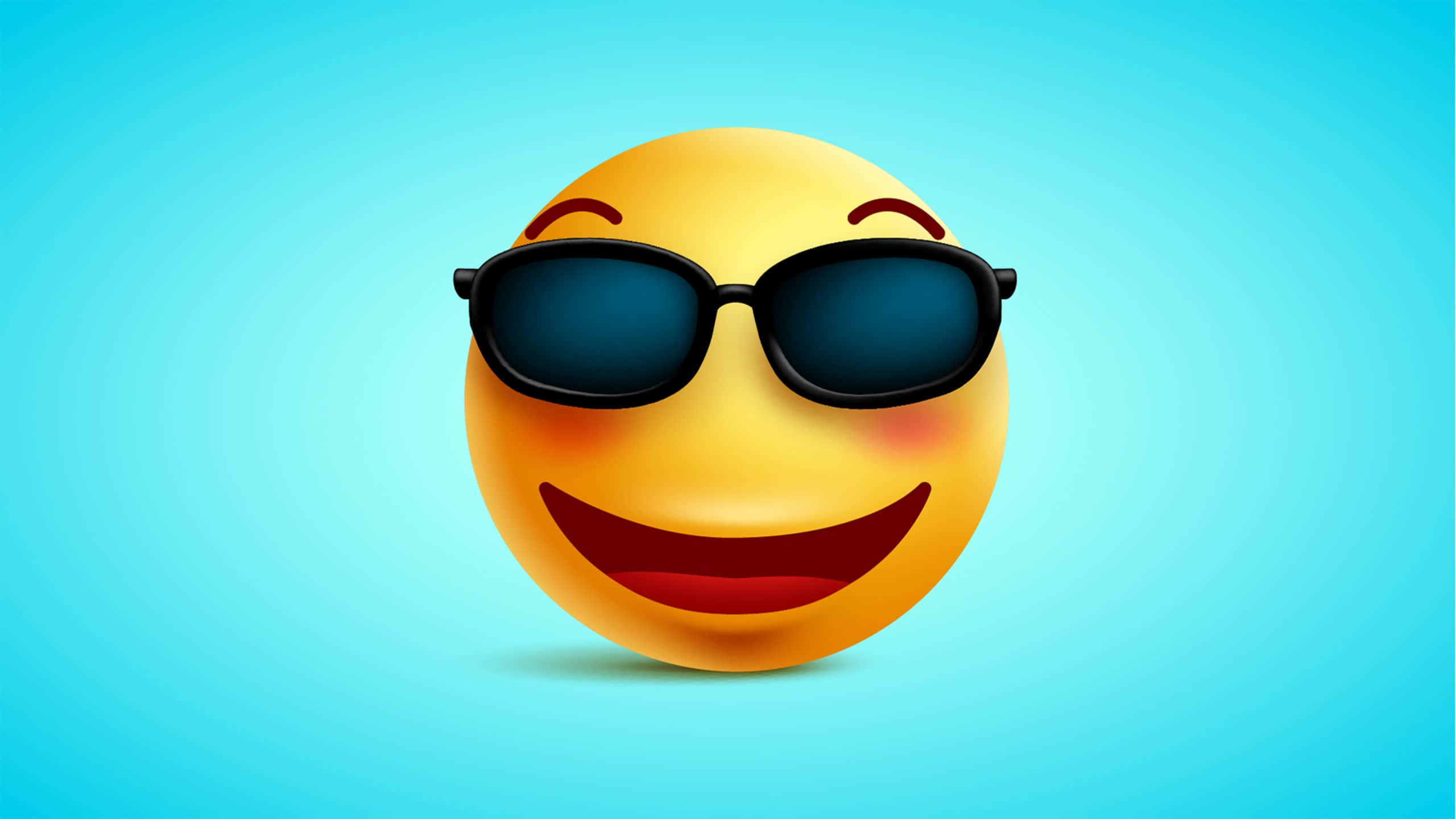 Laughing 桌布 壁紙 — 一個戴著黑色太陽眼鏡的開心黃色表情符號在漸變藍色背景上燦爛微笑。
