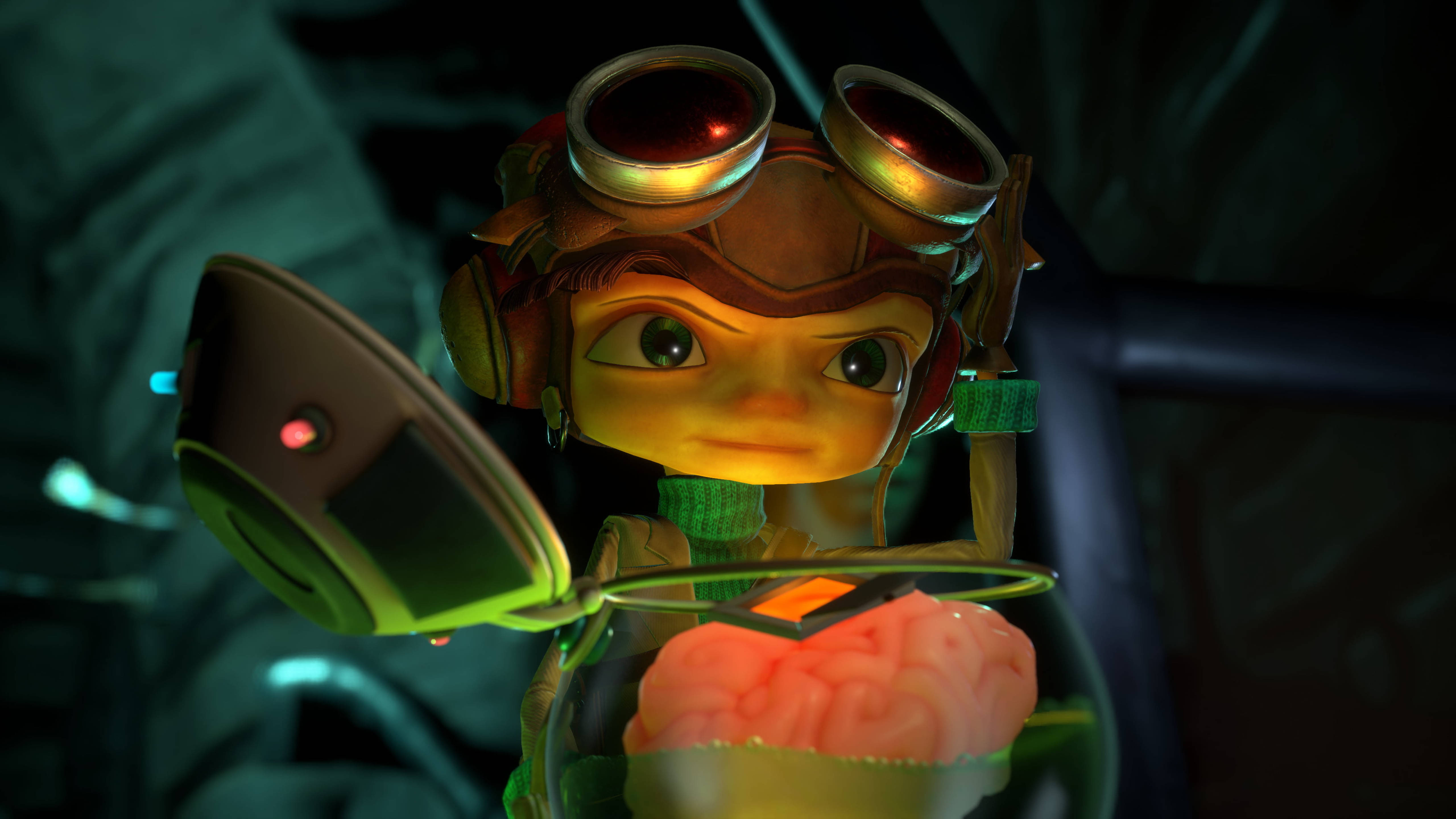 Psychonauts 桌布 壁紙 — 一個戴護目鏡的小型動畫角色在昏暗的綠色實驗室中，拿著一個在燈下罐子裡發光的大腦。