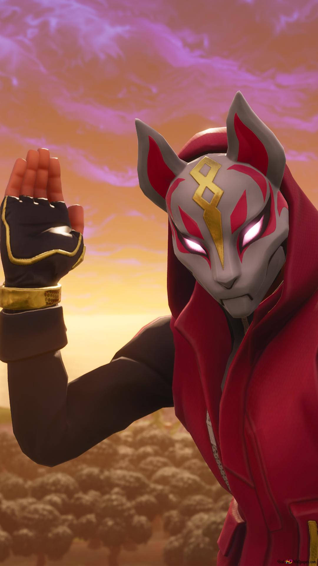 Fortnite 桌布 壁紙 — 一個戴面具、像狐狸的動漫角色，穿著紅色斗篷，在鮮豔的日落天空下舉起手。