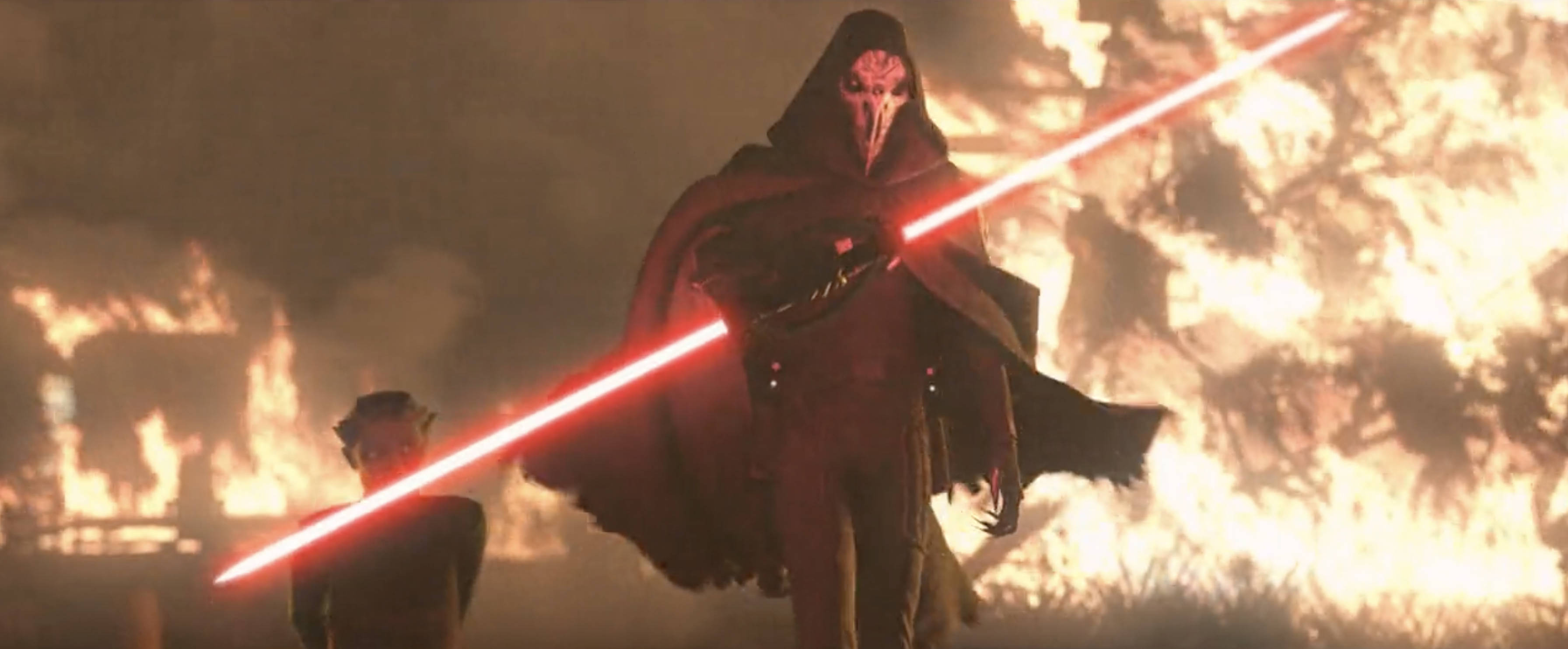 Jedi 桌布 壁紙 — 一個戴面具、身穿黑色斗篷的人物，在煙霧和火焰瀰漫的熾熱戰場上揮舞著紅色光劍。