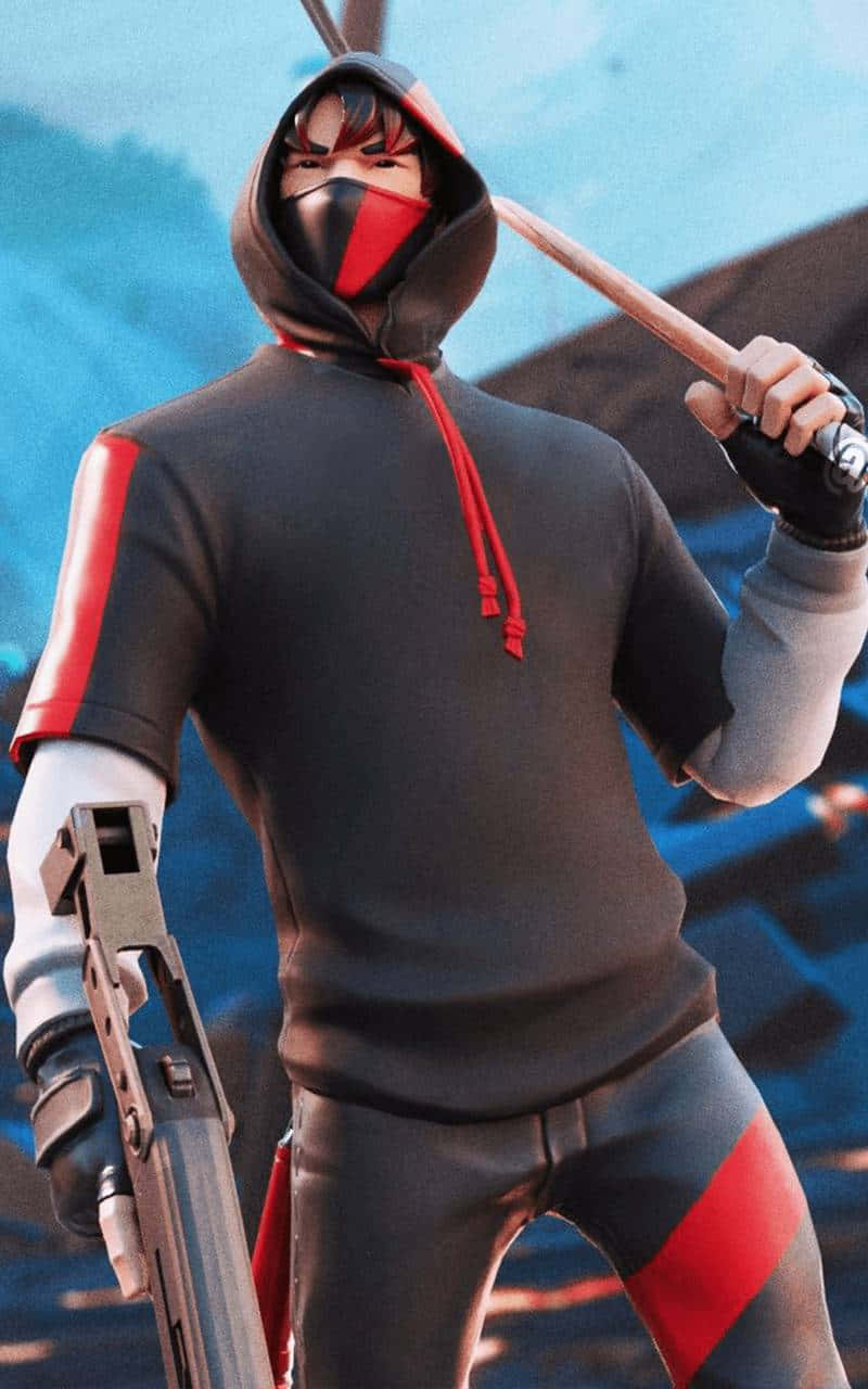 Fortnite Ikonik Skin 桌布 壁紙 — 一個戴面具的動漫角色，身穿黑色和紅色裝備，在藍天背景下揮舞步槍和球棒。
