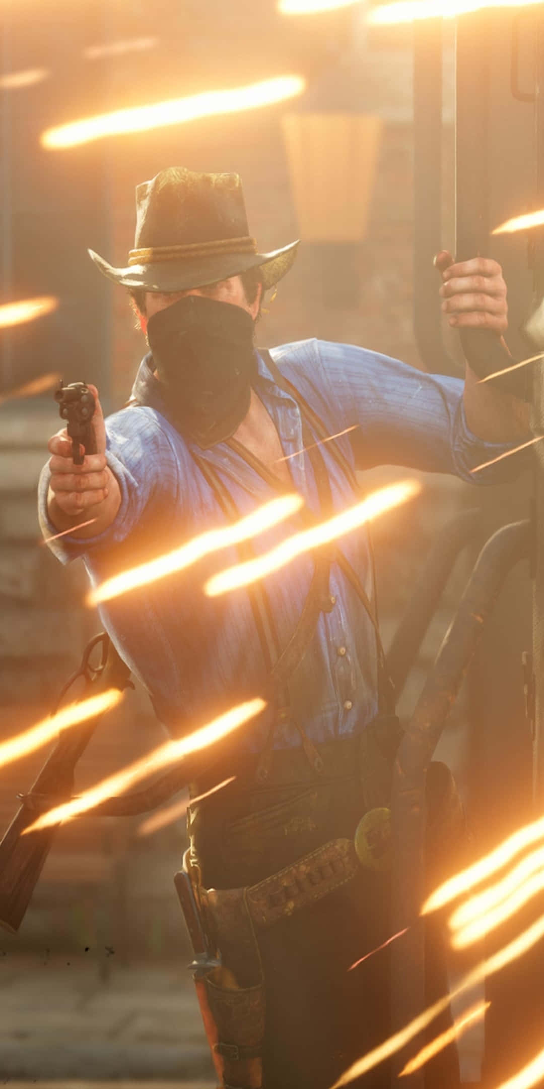 Red Dead Redemtion 2 桌布 壁紙 — 一個戴面具的牛仔穿著藍色襯衫開槍，金色槍口閃光劃過塵土飛揚的空氣。