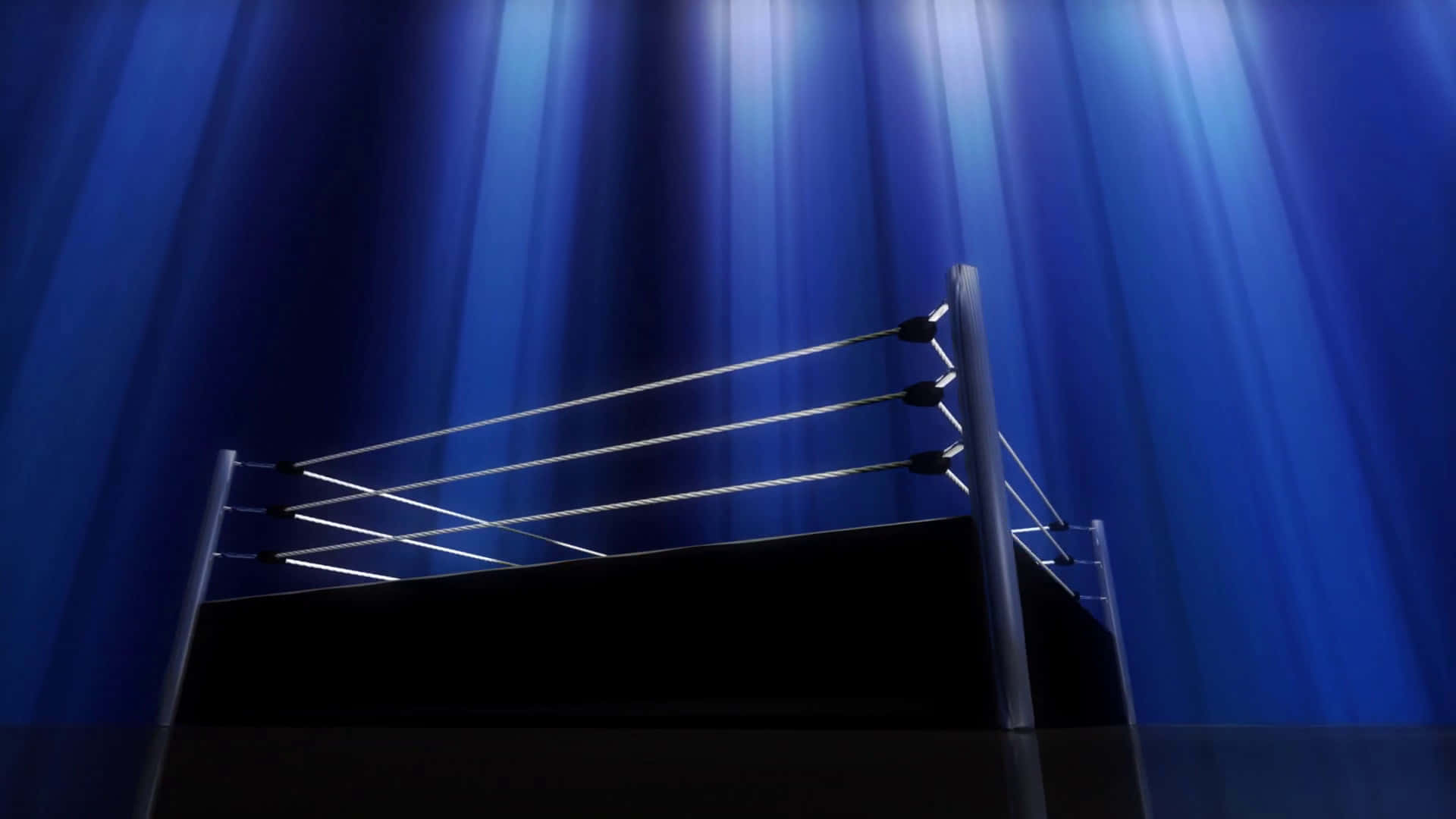 Boxing Ring 桌布 壁紙 — 一個摔角擂台獨自矗立在戲劇性的藍色舞台燈光下，背景是深色窗簾。