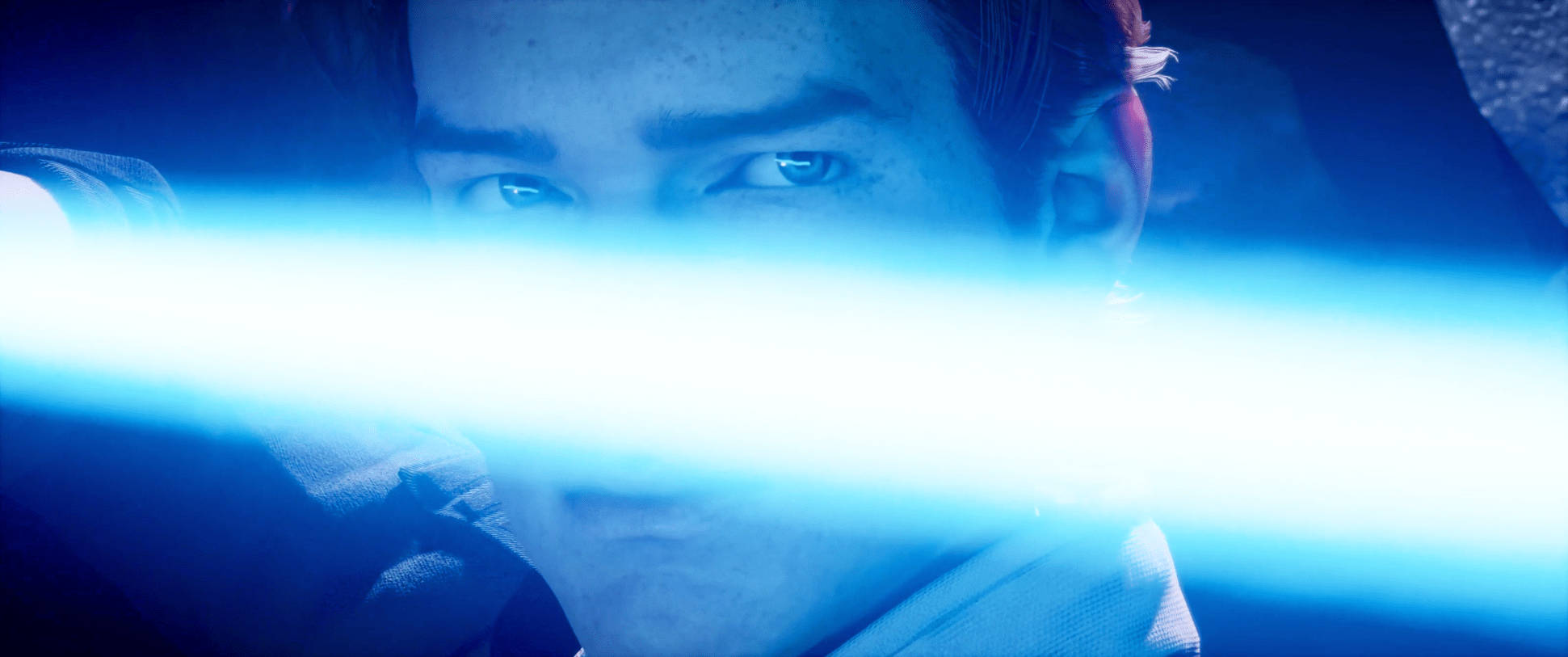 Jedi 桌布 壁紙 — 一個擁有強烈藍眼睛的年輕男子在黑暗環境中透過發光的藍色光劍凝視。