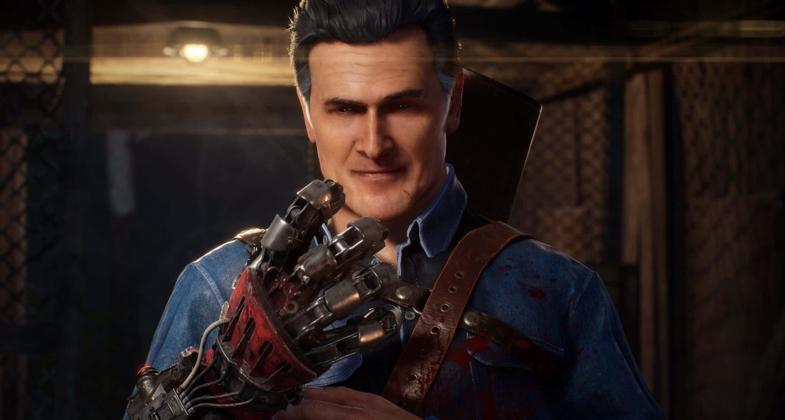 Game Trailers 桌布 壁紙 — 一個擁有機械臂和血跡斑斑襯衫的男人在昏暗的工業環境中微笑。